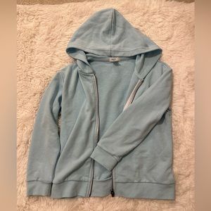 Forever 21 Girls light blue zip up hoodie in size 9/10 l